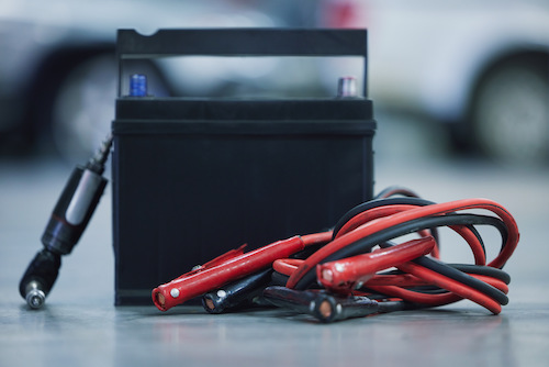 car battery with jumper cables